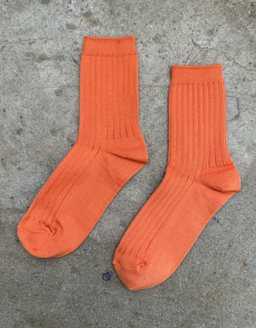 Her Socks in Tangerine